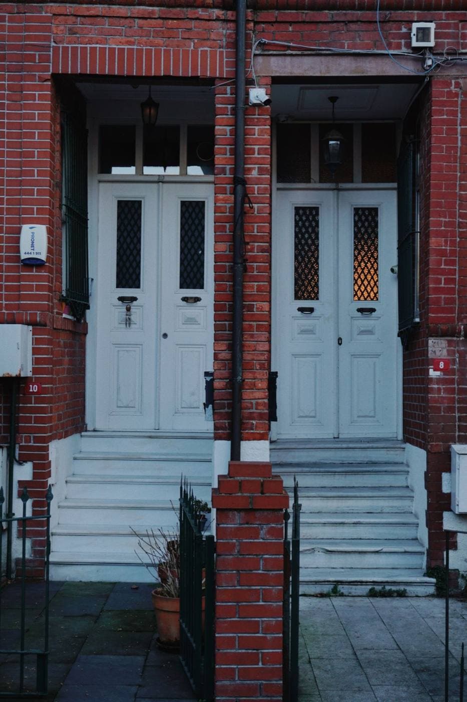Brick two-family house with two front doors side by side